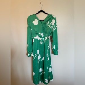 Green floral dress, long sleeve, perfect for spring.